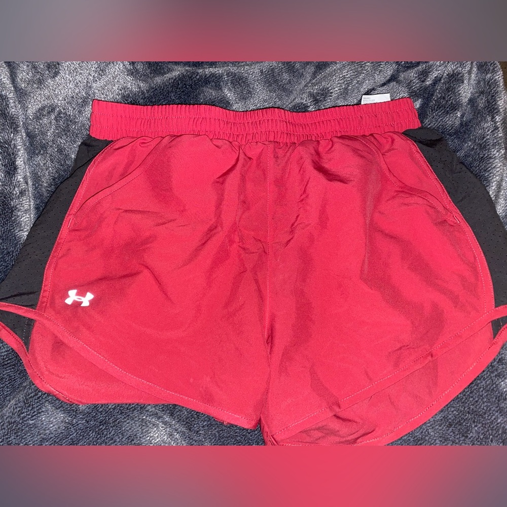 Redish pinkish under armor shorts with pockets